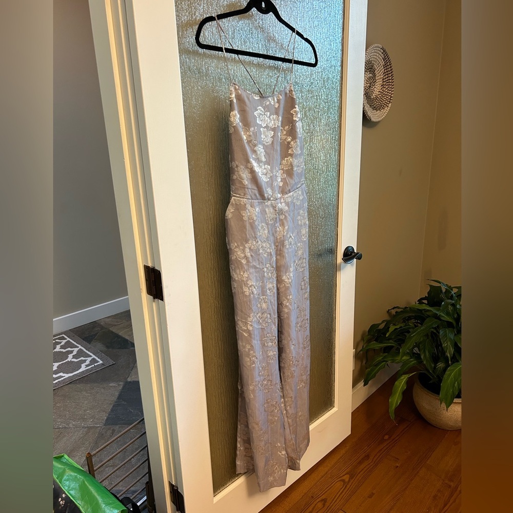 Brand NWOT, never worn, just hung in closet and then transferred to storage bin!